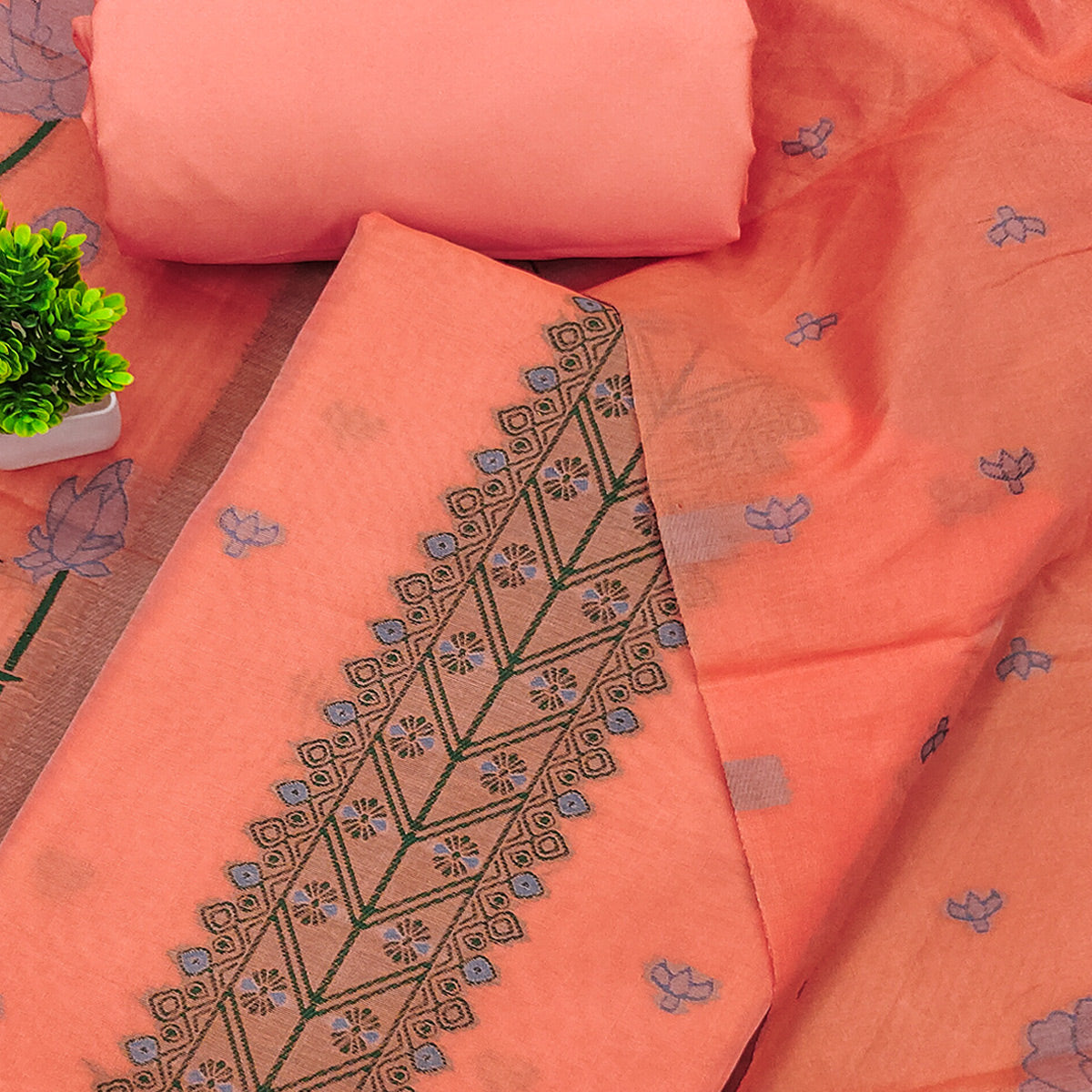 Peach Ethnic Dress Material Showcasing Handloom Style Floral Zari Weaving