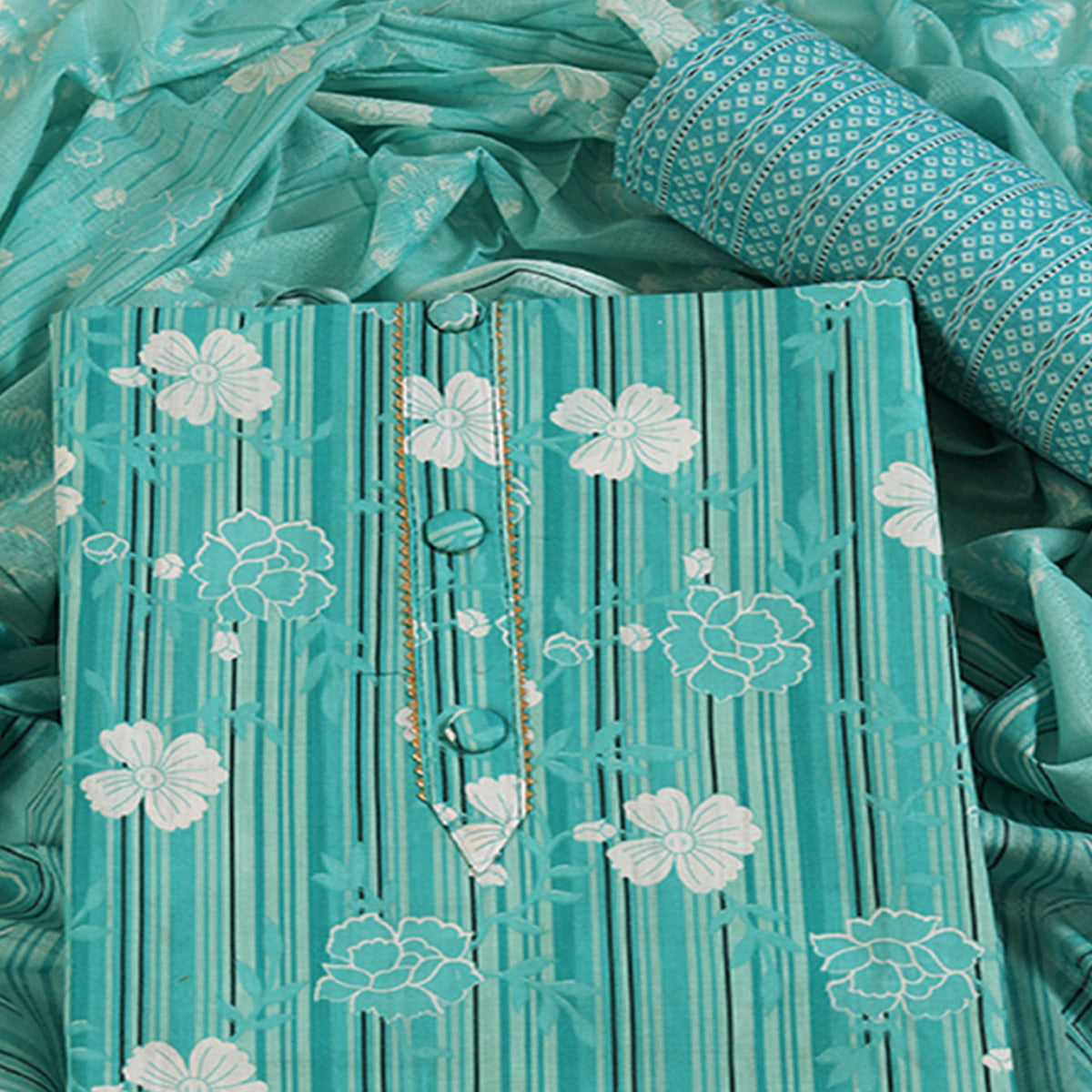 Elegant Sea Green Pure Cotton Ensemble Showcasing Subtle Floral Print Work Dress Material