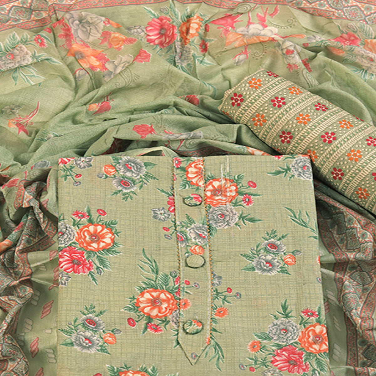 Charming Green Dress Material in Pure Cotton with Subtle Floral Pattern Work