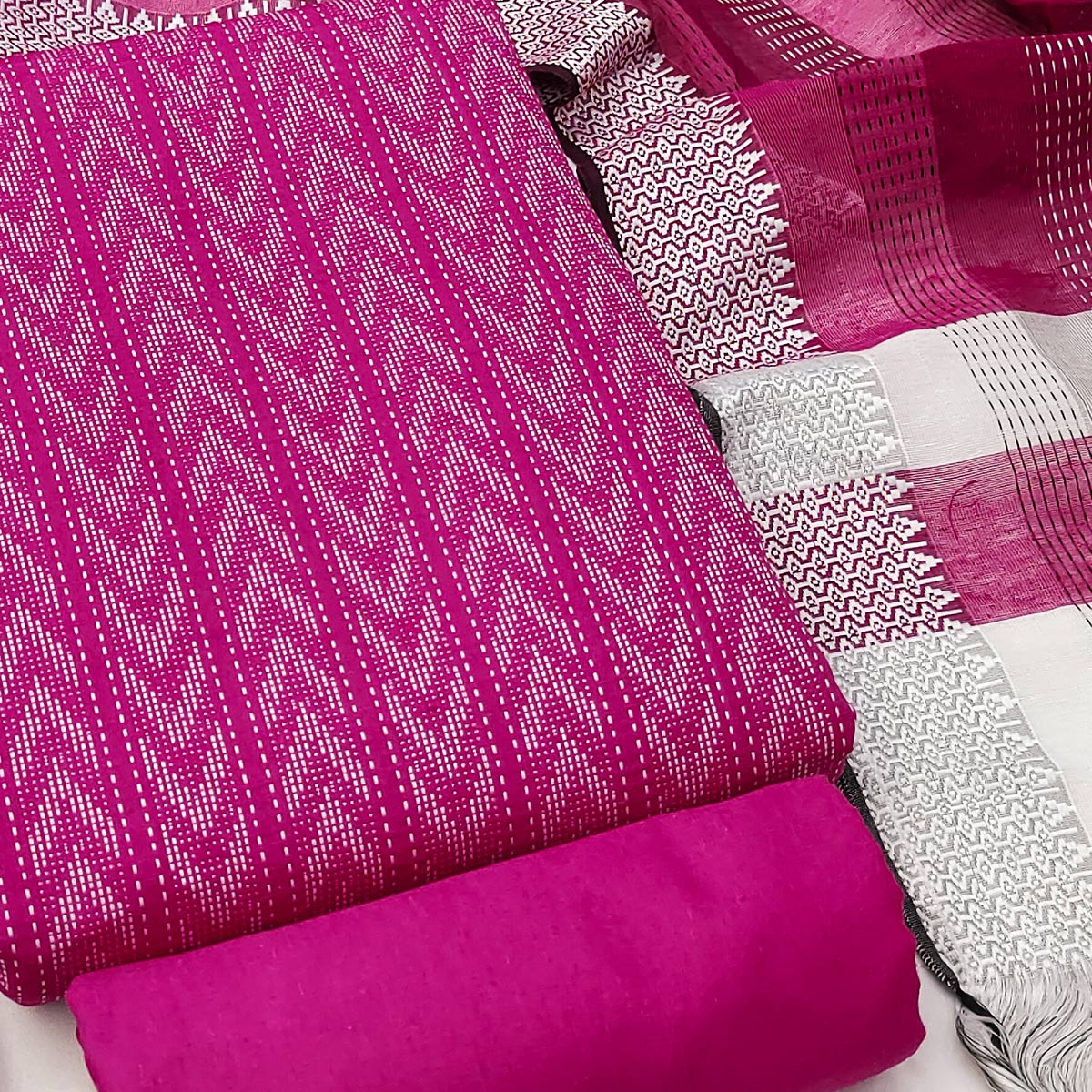 Redefine Elegance With This Pink Chevron Woven Pattern Cotton Blend Dress Material