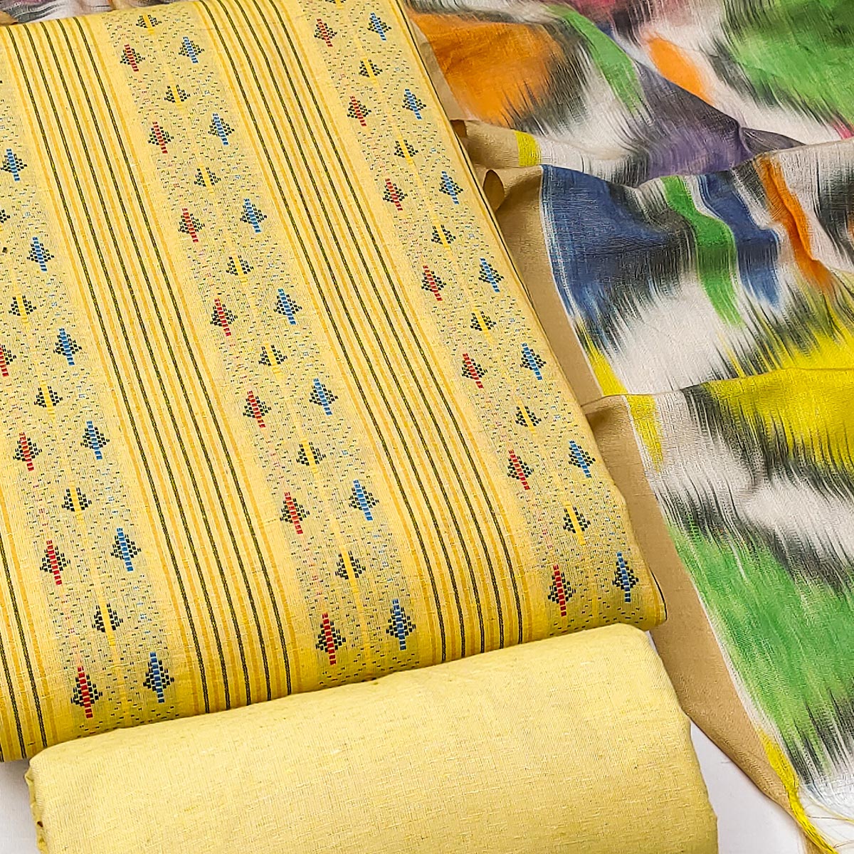 Unleash Your Style With This Yellow Woven Cotton Blend Dress Material