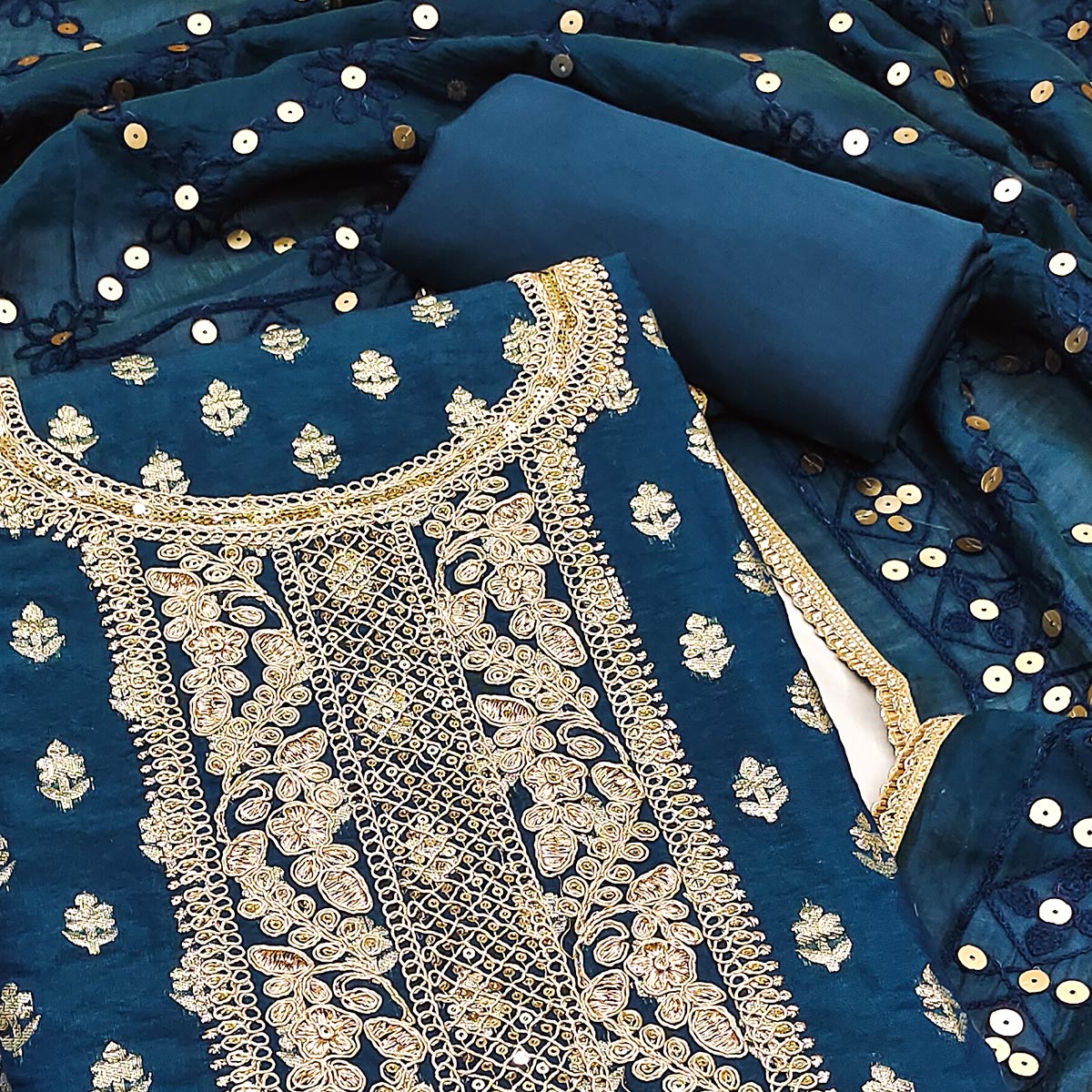 Redefine Elegance With This Morpich Floral Cording Zari Embroidered Chanderi Dress Material