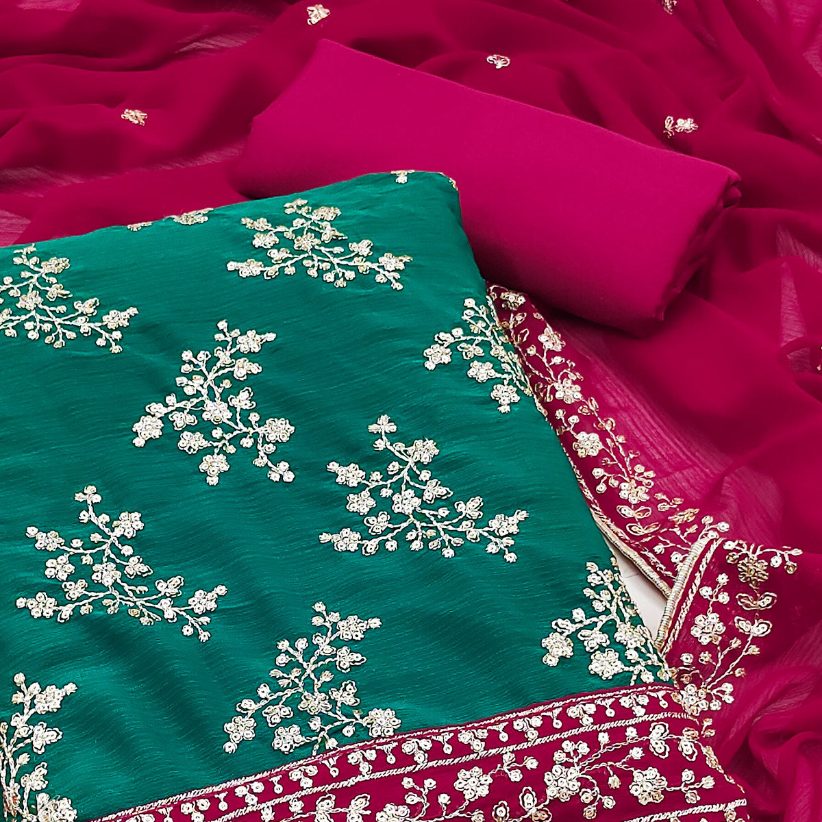 Unleash Your Style With This Rama Green Floral Sequins Embroidered Zomoto Art Silk Dress Material