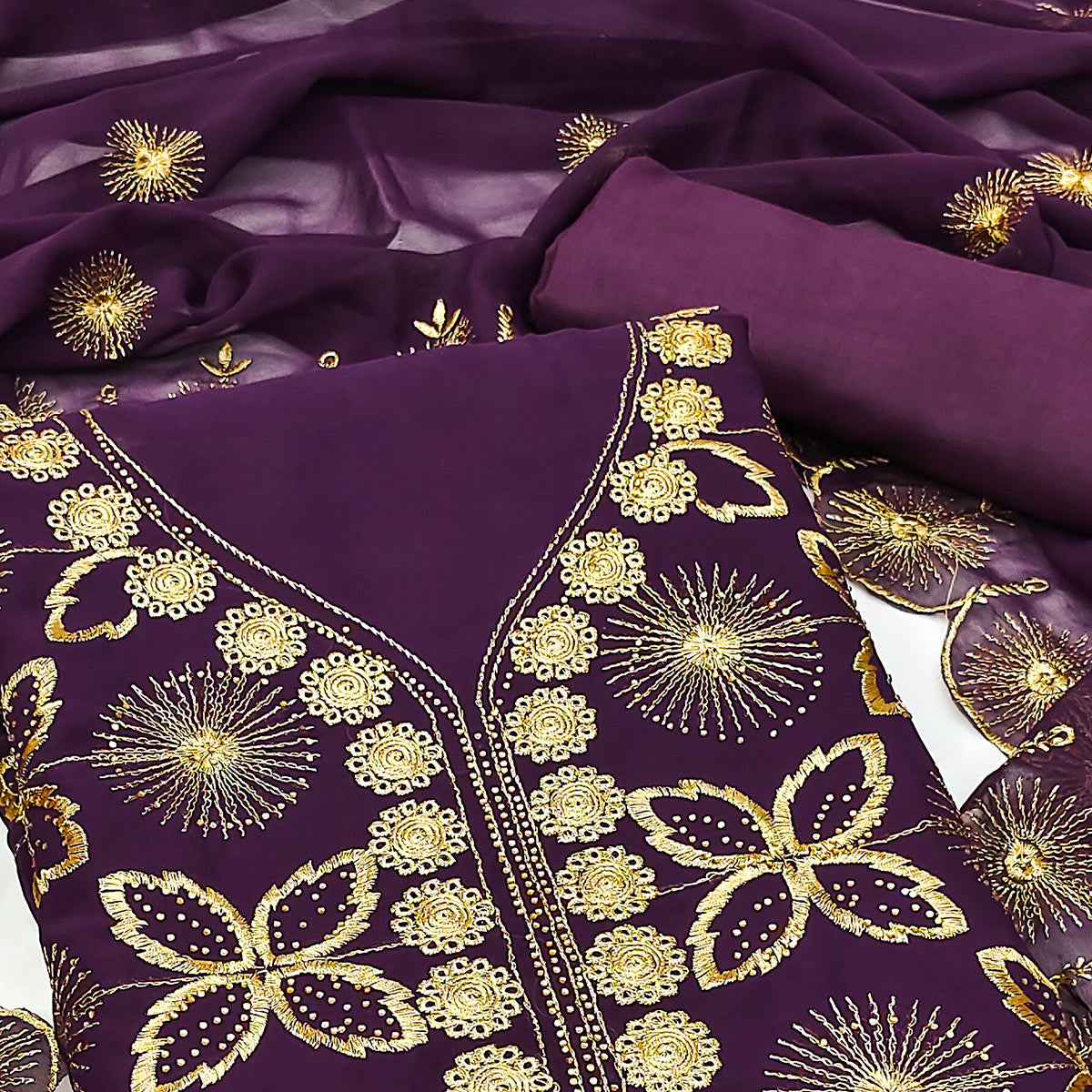 Wine Georgette Dress Material Featuring Delicate Floral Zari Embroidery