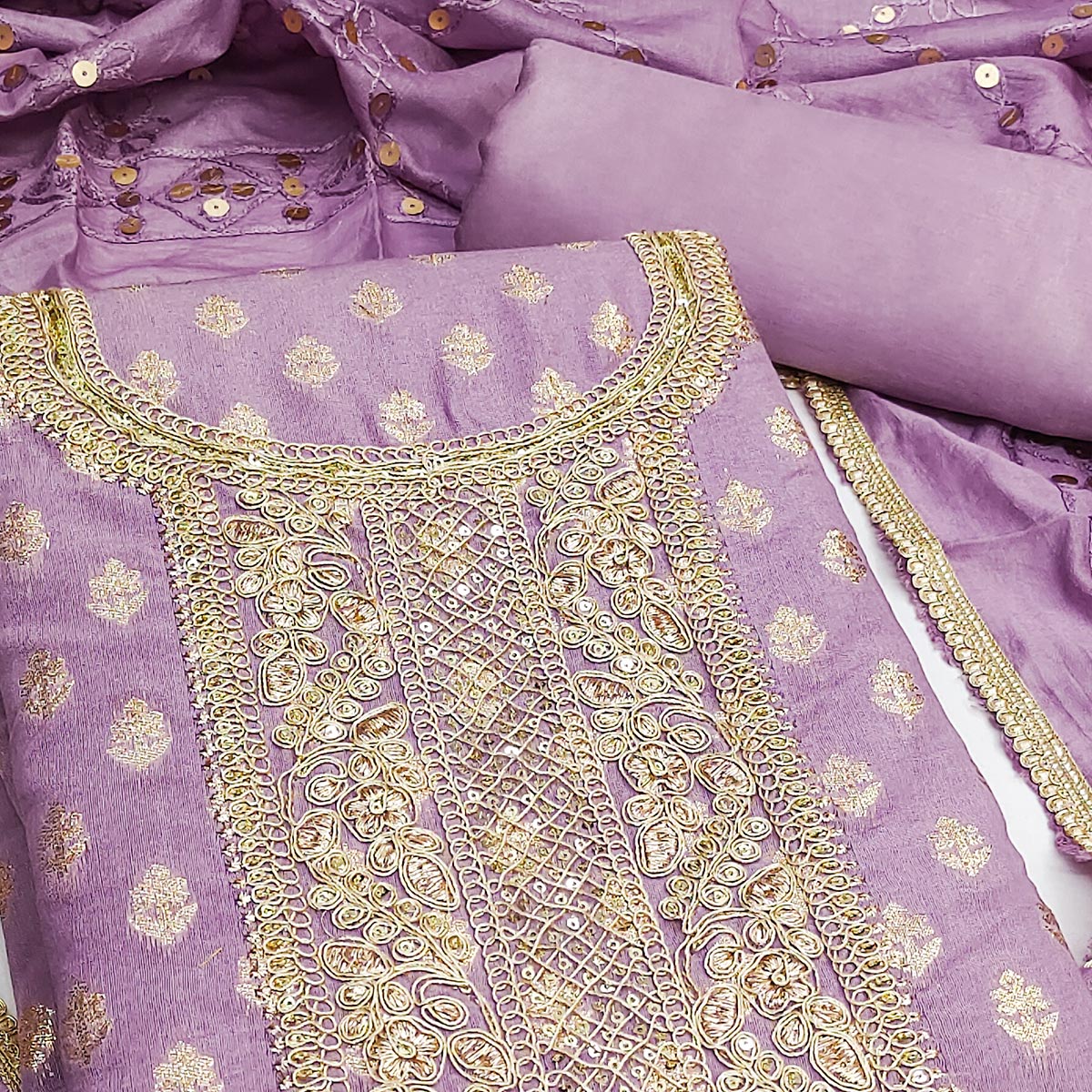 Lavender Chanderi Cotton Fabric with Elegant Butti Zari Weaving for a Festive Yet Soft Look