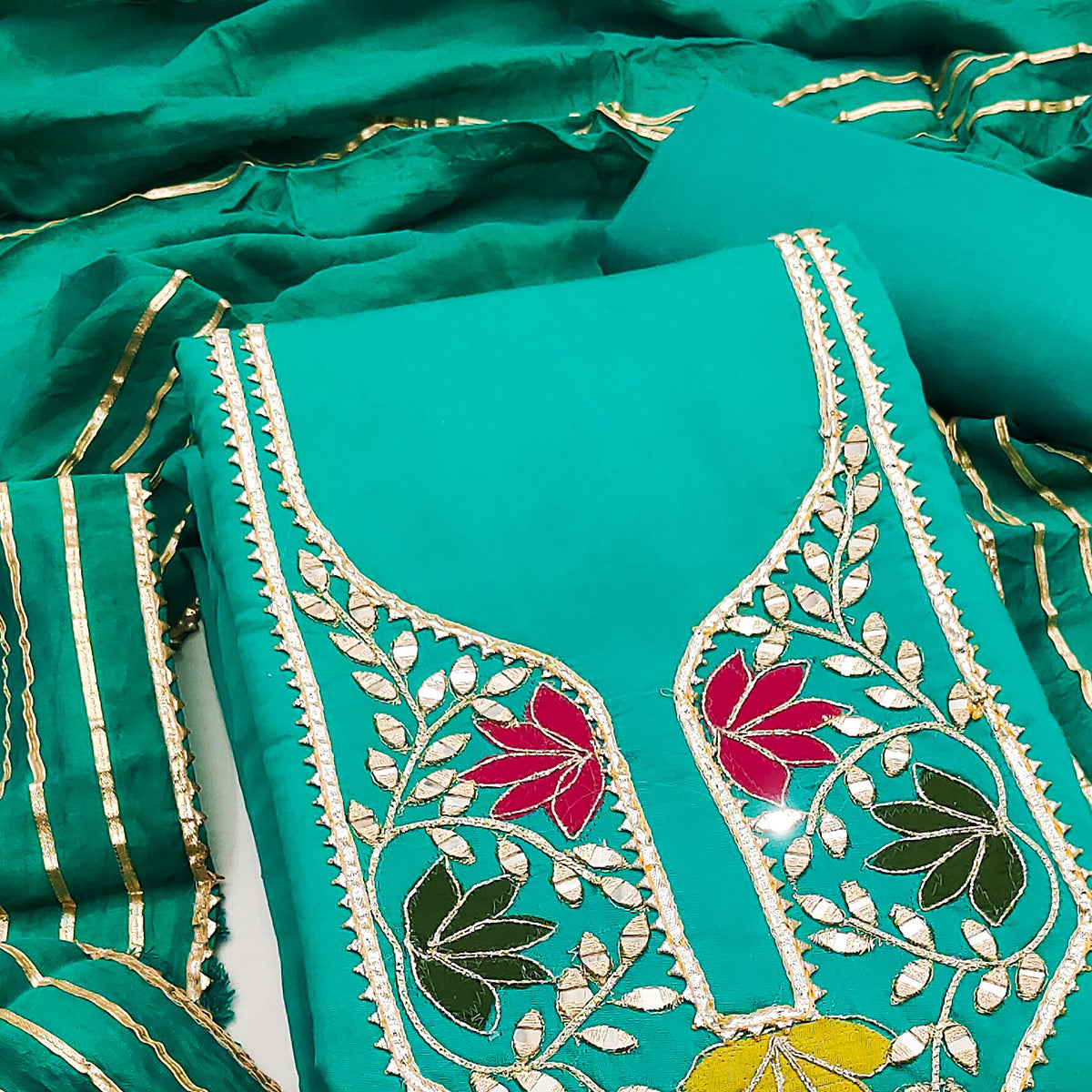 Rama Green Floral Embroidery Chanderi Cotton Dress Material Embellished With Mirror & Gota Patti
