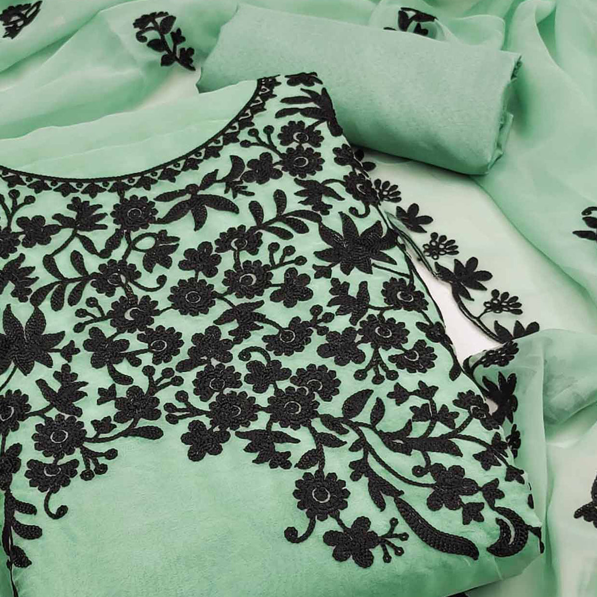 Sea Green Georgette Dress Material Adorned With Delicate Floral Thread Embroidery