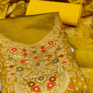 Mustard Banarasi Silk Jacquard Dress Material Adorned With Intricate Floral Zari Weaving