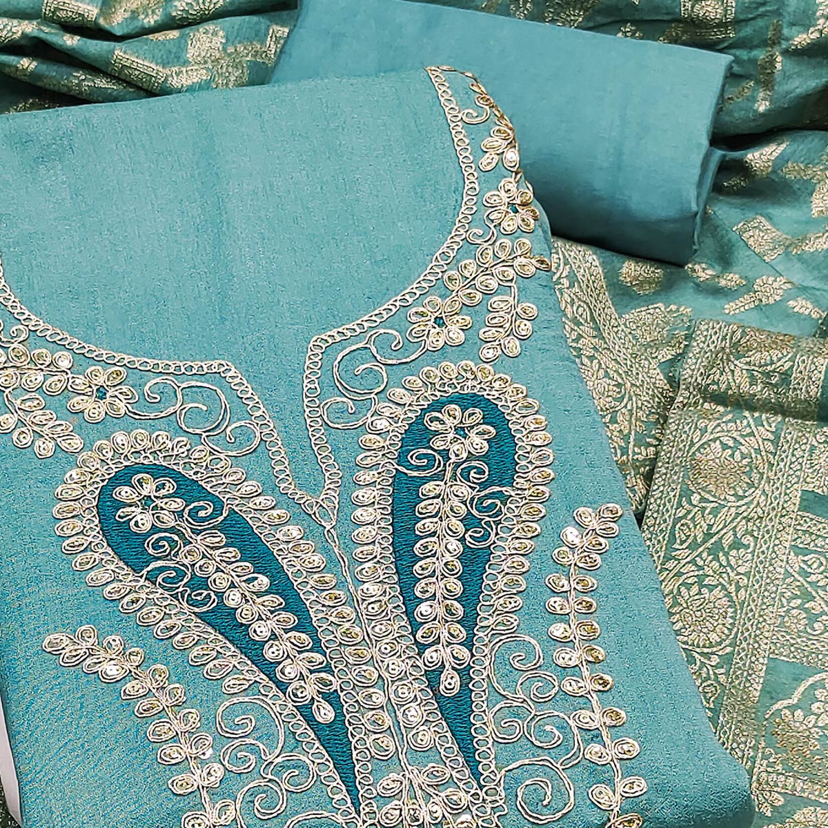 Turquoise Vichitra Silk Dress Material Enhanced With Elegant Floral Sequins Cording Embroidery