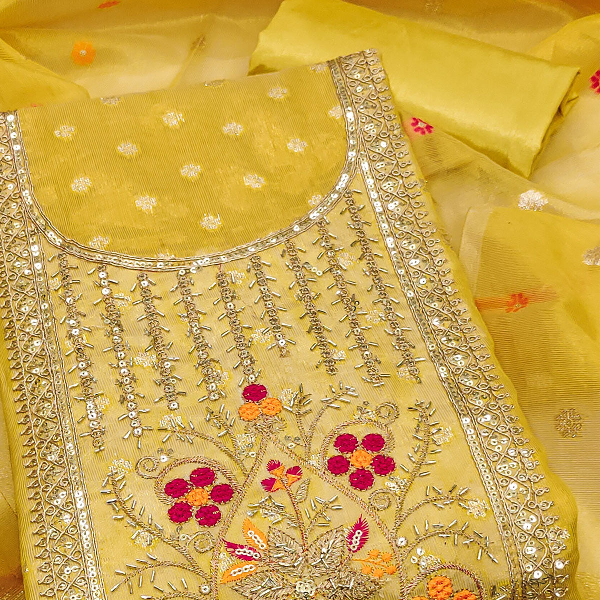 Yellow Shimmer Dress Material Adorned With Graceful Floral Weaving & Delicate Sequins Embroidery