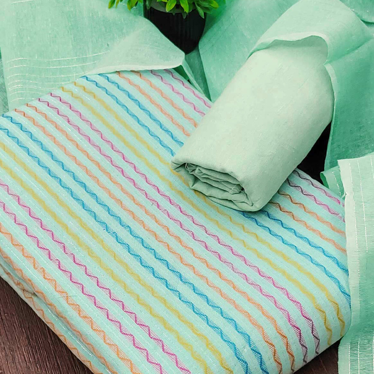 Sea Green Poly Cotton Blend  Dress Material Highlighted With Striped Woven Work