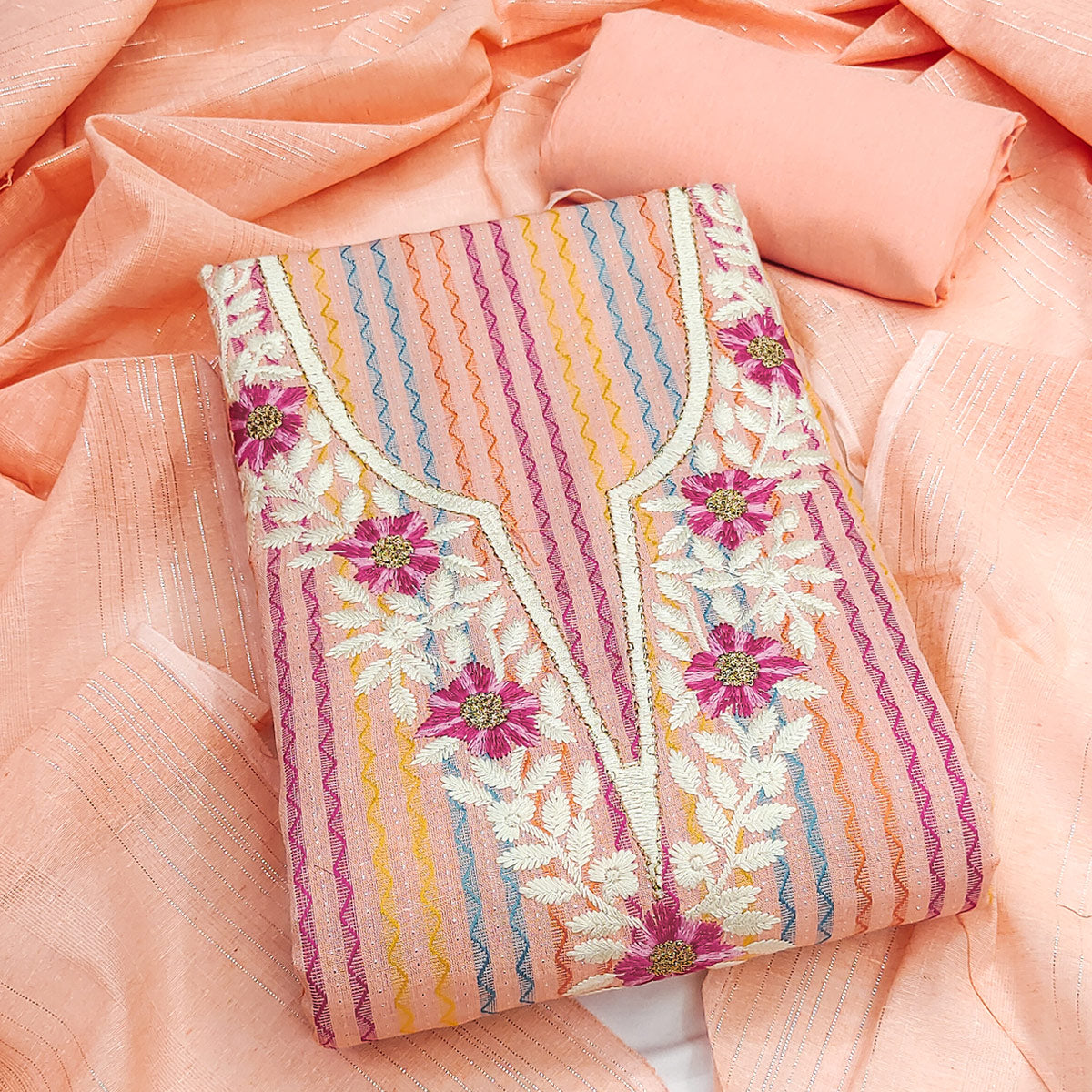 Peach Cotton Blend Dress Material Highlighted With Floral Embroidery & Modern Stripes