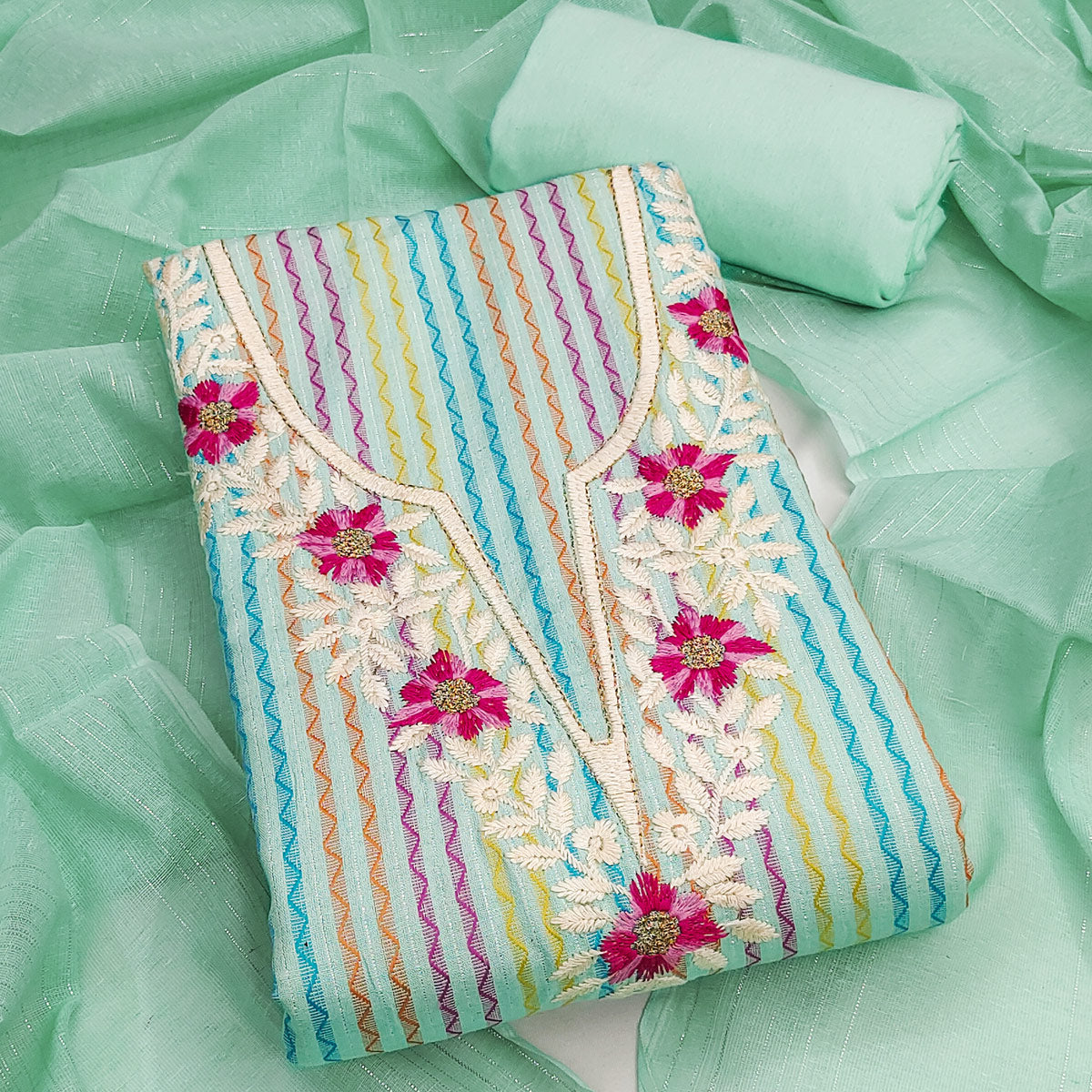 Sea Green Cotton Blend Dress Material Highlighted With Floral Embroidery & Modern Stripes