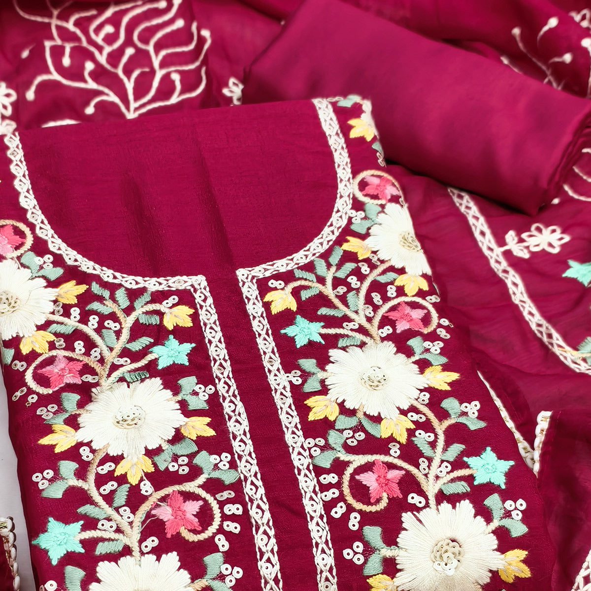 Stylish Rani Pink Floral Thread & Sequins Detailed Embroidery Vichitra Silk Dress Material