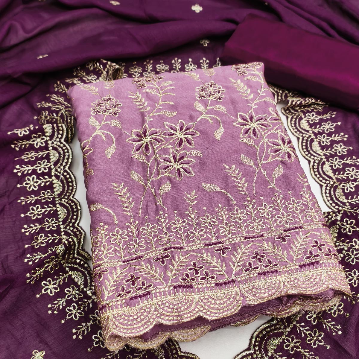 Graceful Purple Vichitra Silk Dress Material Adorned With Intricate Floral Thread Embroidery