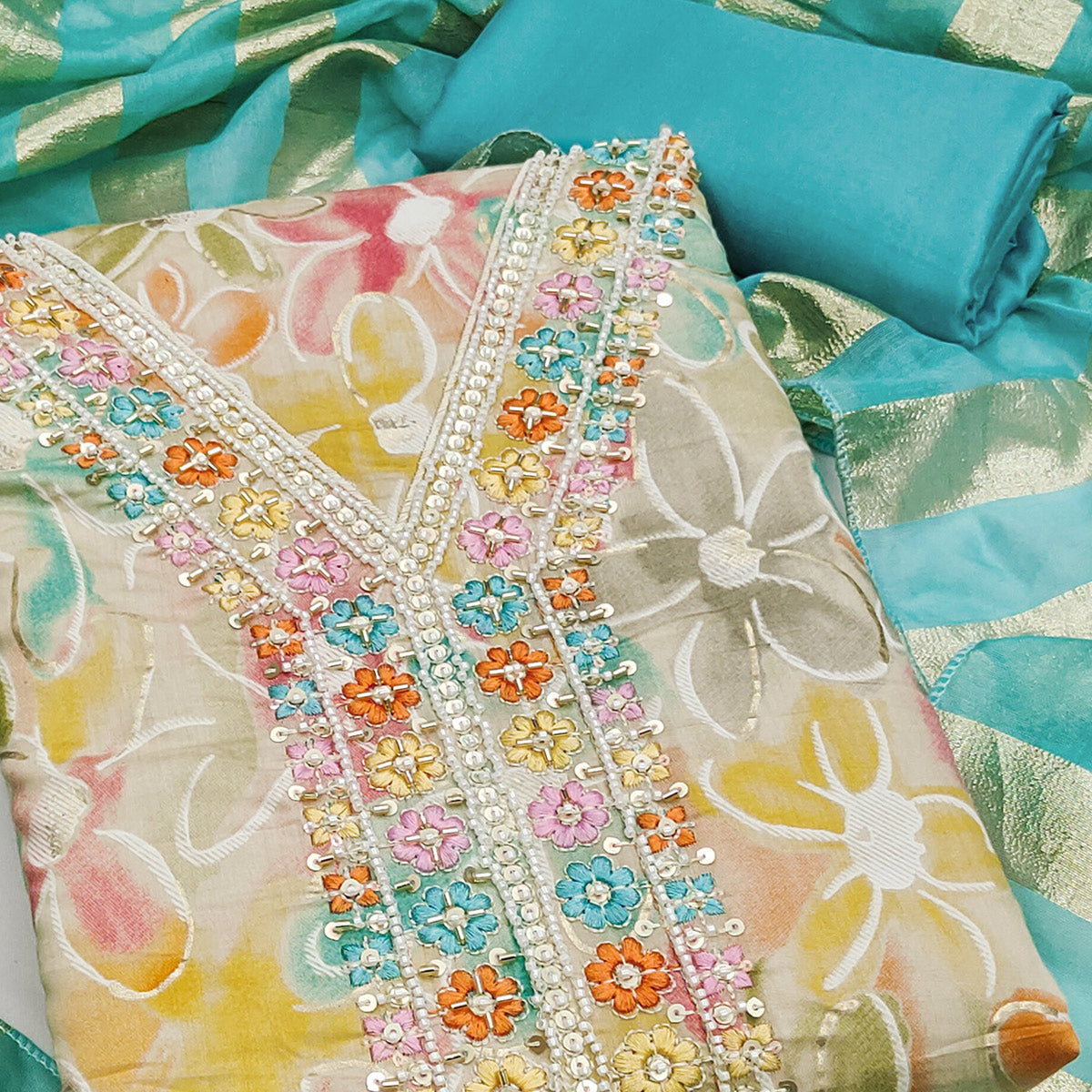 Vibrant Turquoise Floral Printed Roman Art Silk Dress Material Adorned With Beads & Sequins