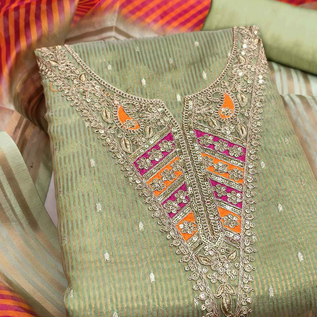 Premium Green Shimmer Dress Material With Detailed Butti Weaving & Cording Embroidery
