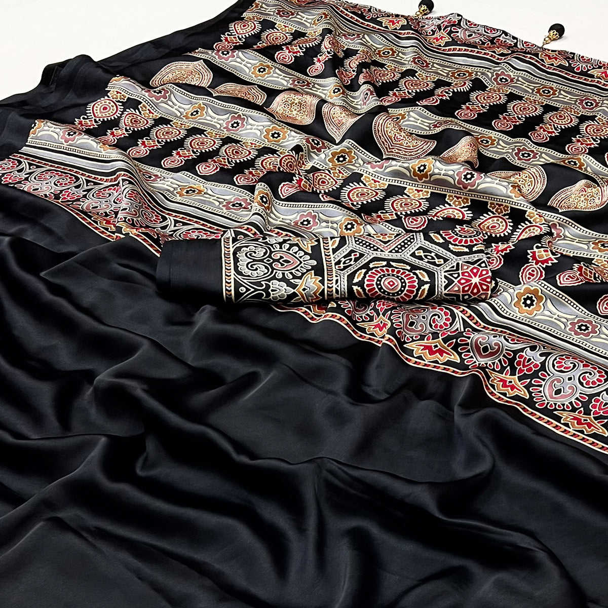 Black Ajrakh Printed Crepe Satin Saree With Tassels