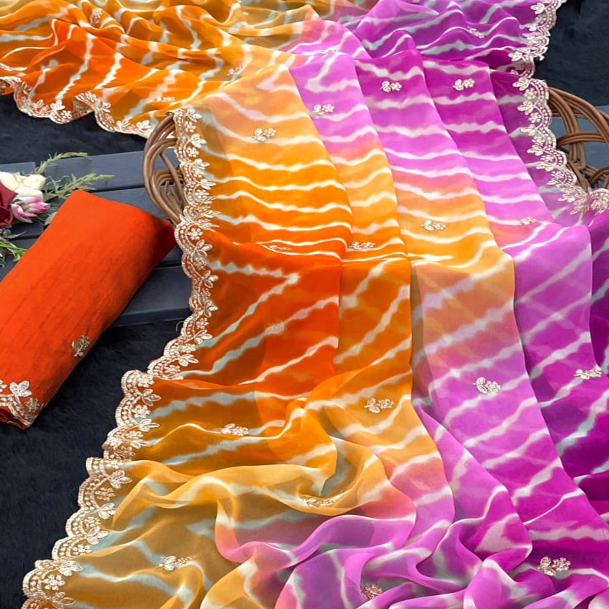 Festive Georgette Saree in Orange & Purple with Ethnic Leheriya Print and Fine Embroidery