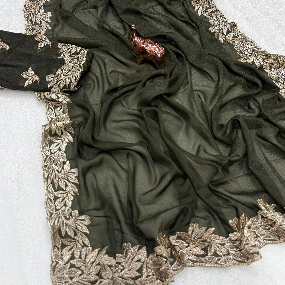 Stylish Mehendi Green Star Chiffon Saree with Traditional Zari Embellished Border