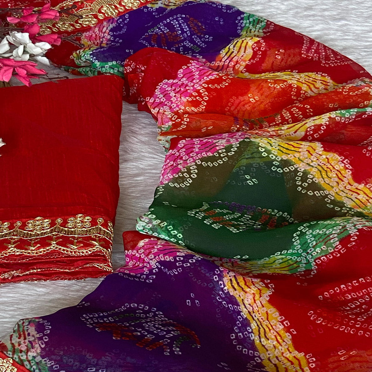 Red Georgette Saree with Bandhani Motifs and Elegant Border Embroidery