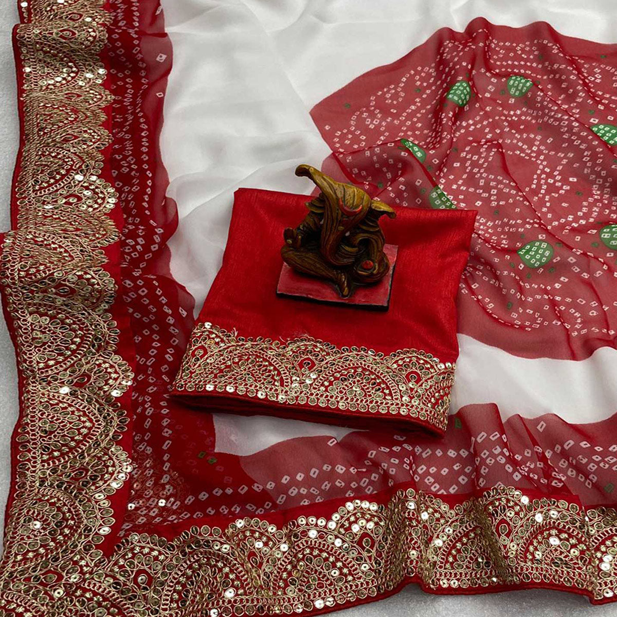 White & Red Bandhani Printed With Sequins Embroidered Georgette Saree