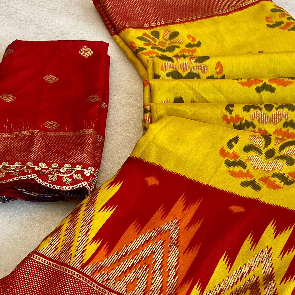 Yellow Patola Printed Dola Silk Saree With Sequins Border