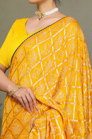 Yellow Vichitra Silk Saree Featuring Bandhani Patterns and Graceful Embroidered Borders