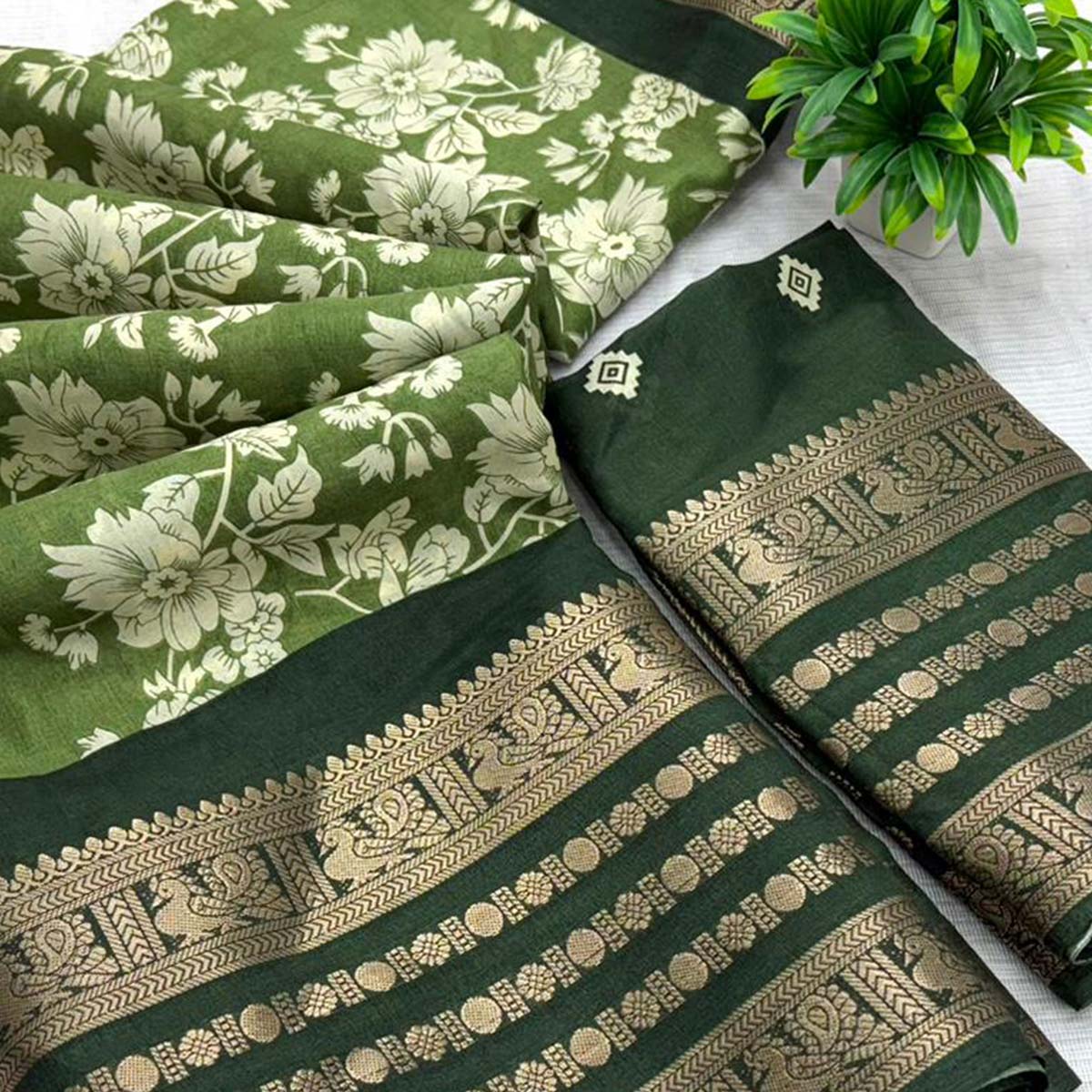 Luxurious Green Floral Print Dola Silk Saree With Intricate Peacock Motif Zari Woven Border