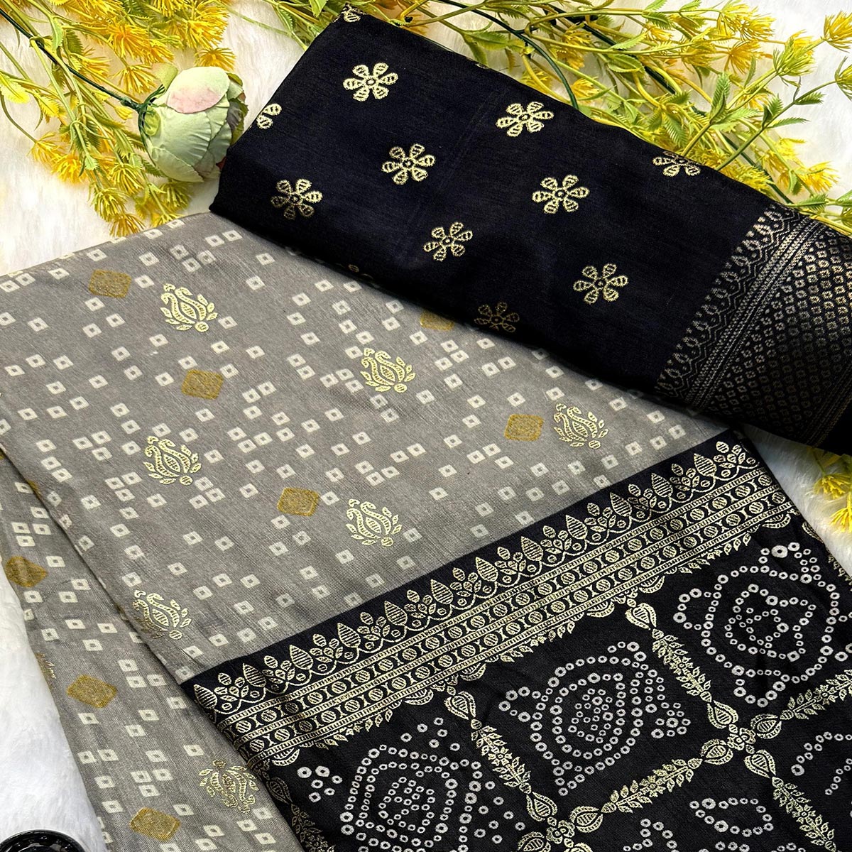 Grey & Black Dola Silk Saree Featuring Traditional Bandhani Print & Woven Border
