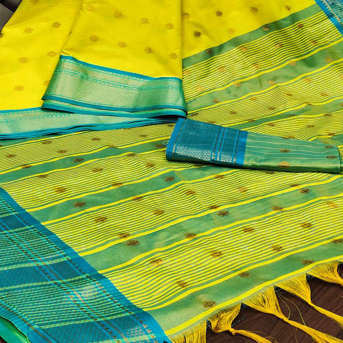 Lemon Yellow Zari Woven Lichi Art Silk Saree With Tassels