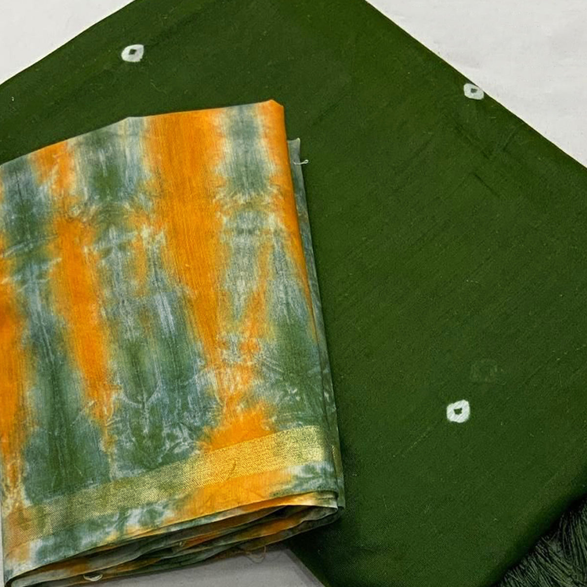 Green Linen Cotton Saree Adorned with Vibrant Bandhani Prints and Breezy Texture