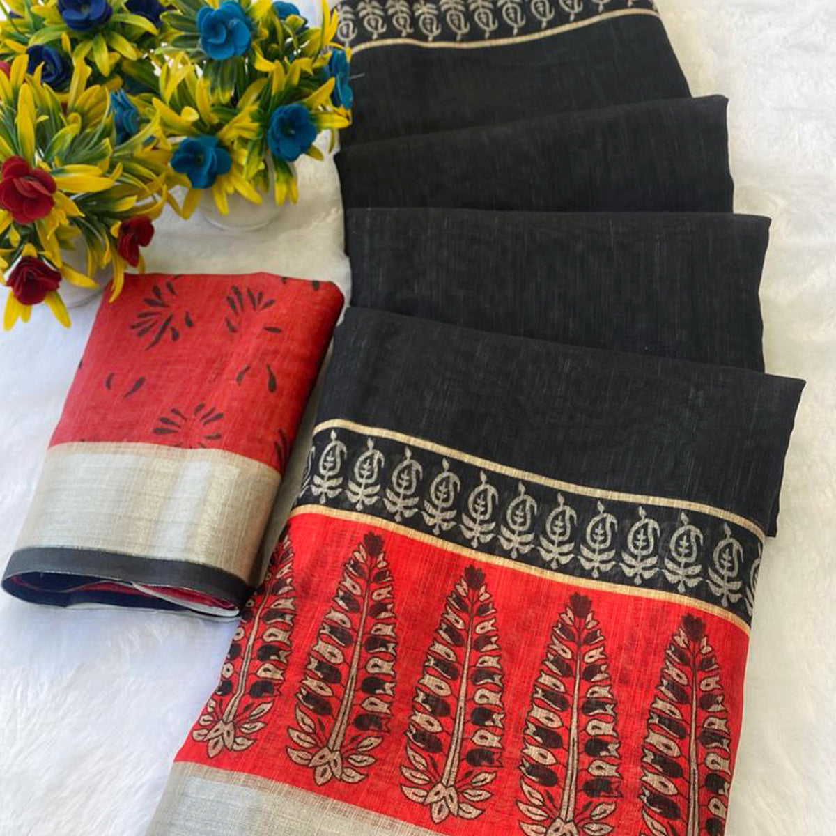 Black & Red Linen Cotton Saree Adorned with Vibrant Floral Prints and Breezy Texture