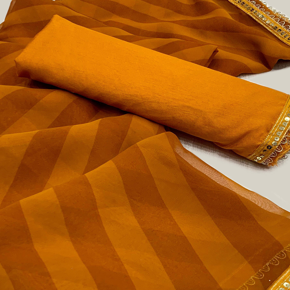 Mustard Printed Georgette Saree With Lace Border