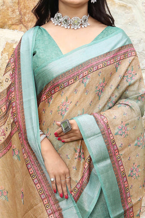 Beautiful Beige & Mint Green Tissue Handloom Saree with Detailed Digital Floral Embellishments