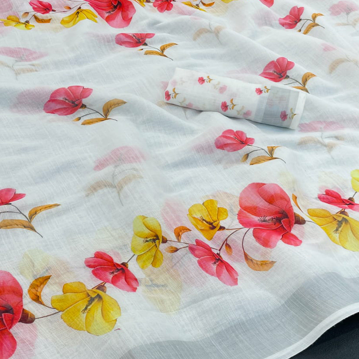 Elegant White Floral Printed Linen Cotton Saree With Delicate Tassel Detailing