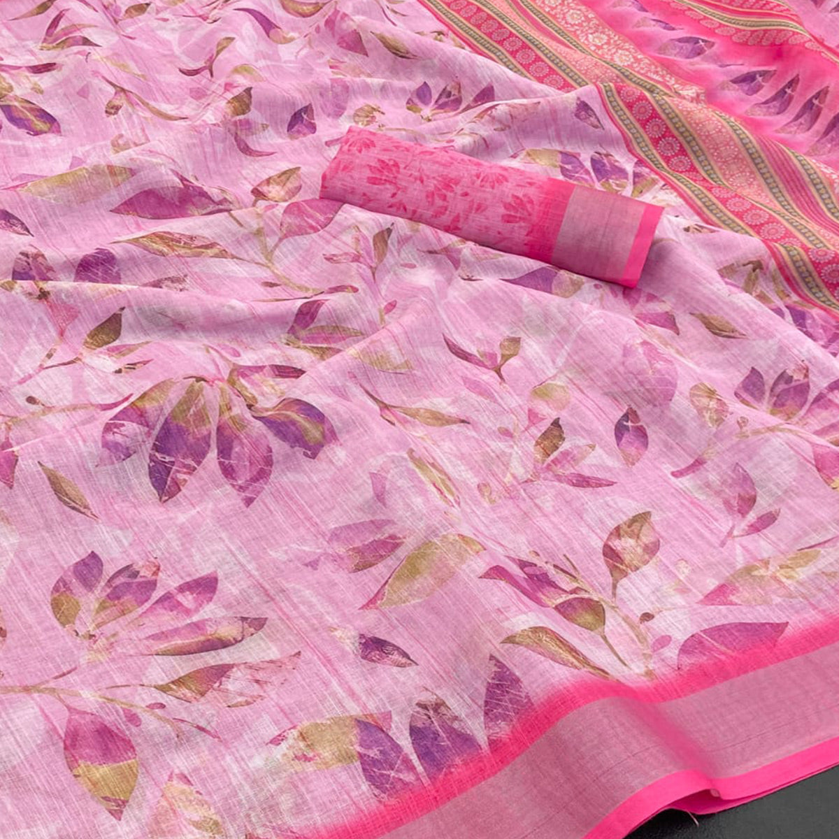 Charming Pink Floral Linen Cotton Saree Adorned With Elegant Tassel Detailing