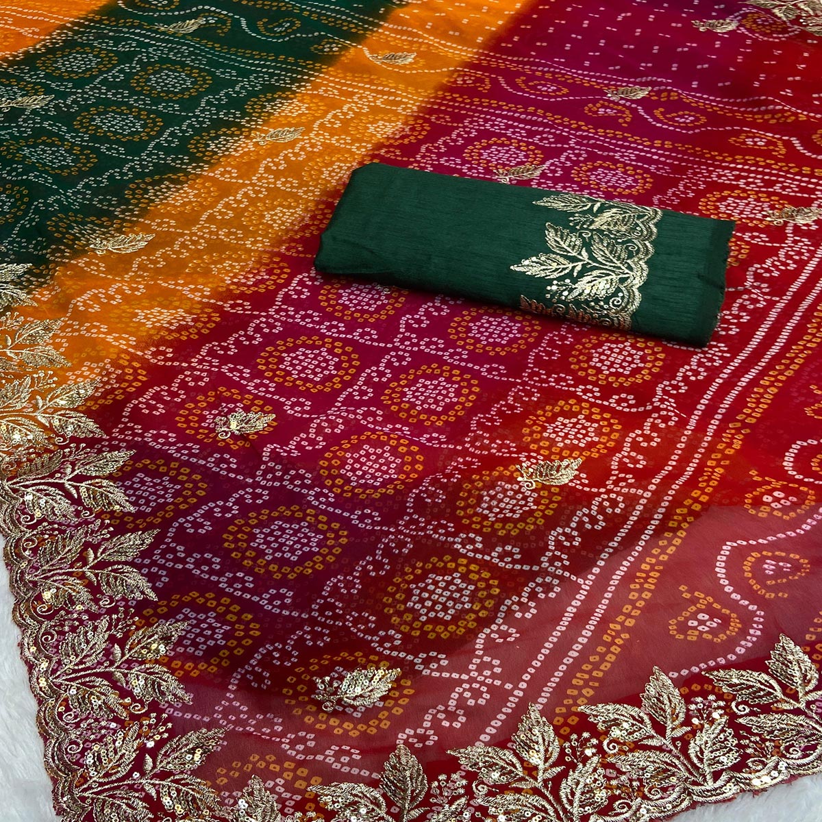 Multicolor Bandhani Georgette Saree Enhanced with Lavish Embroidered Border