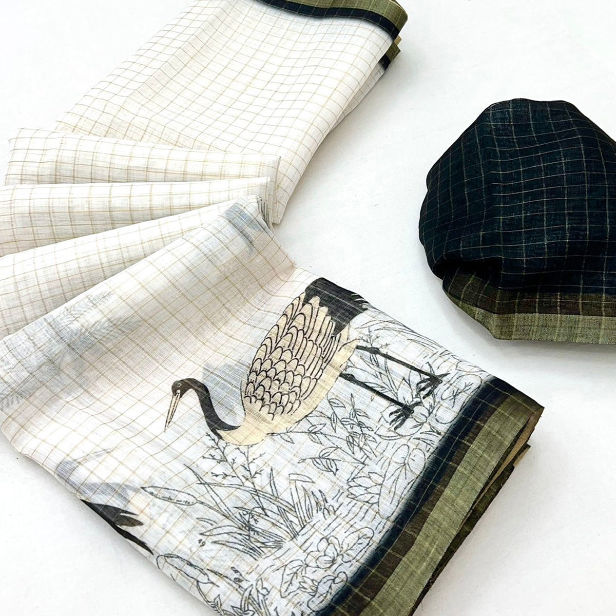 Off White and Black Checkered Printed Linen Saree with a Breezy Feel