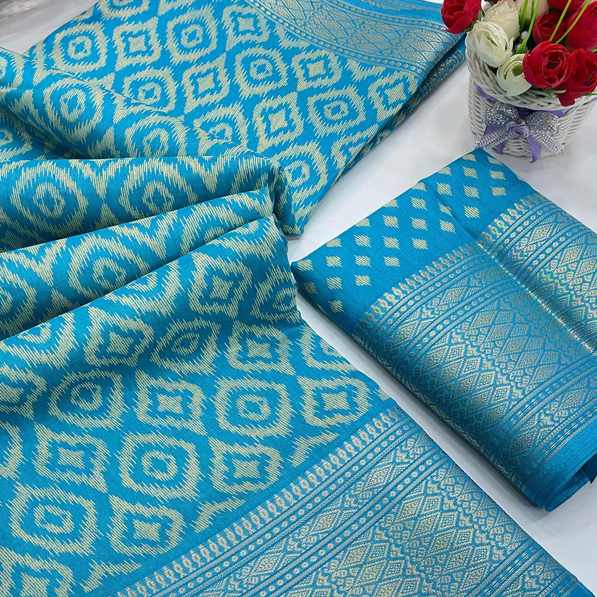 Blue Ikkat Printed Dola Silk Saree Highlighted With Premium Zari Weaving Border