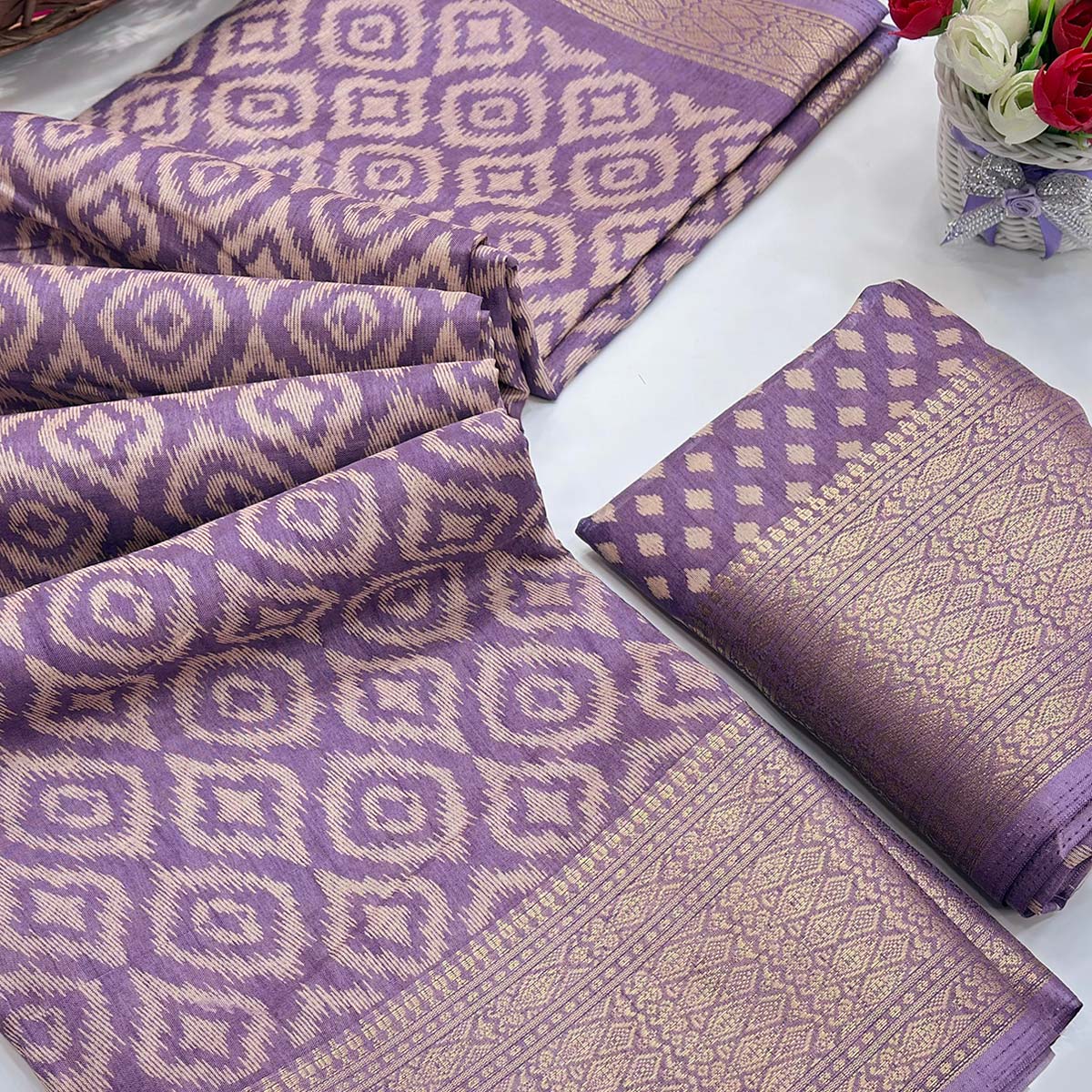 Lavender Ikkat Printed Dola Silk Saree Highlighted With Premium Zari Weaving Border