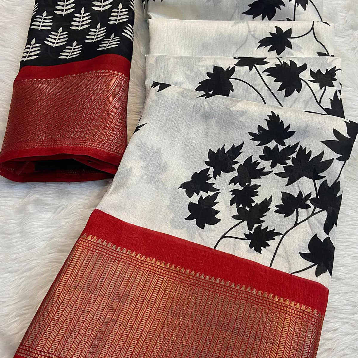 White & Red Floral Printed Dola Silk Saree With Woven Border