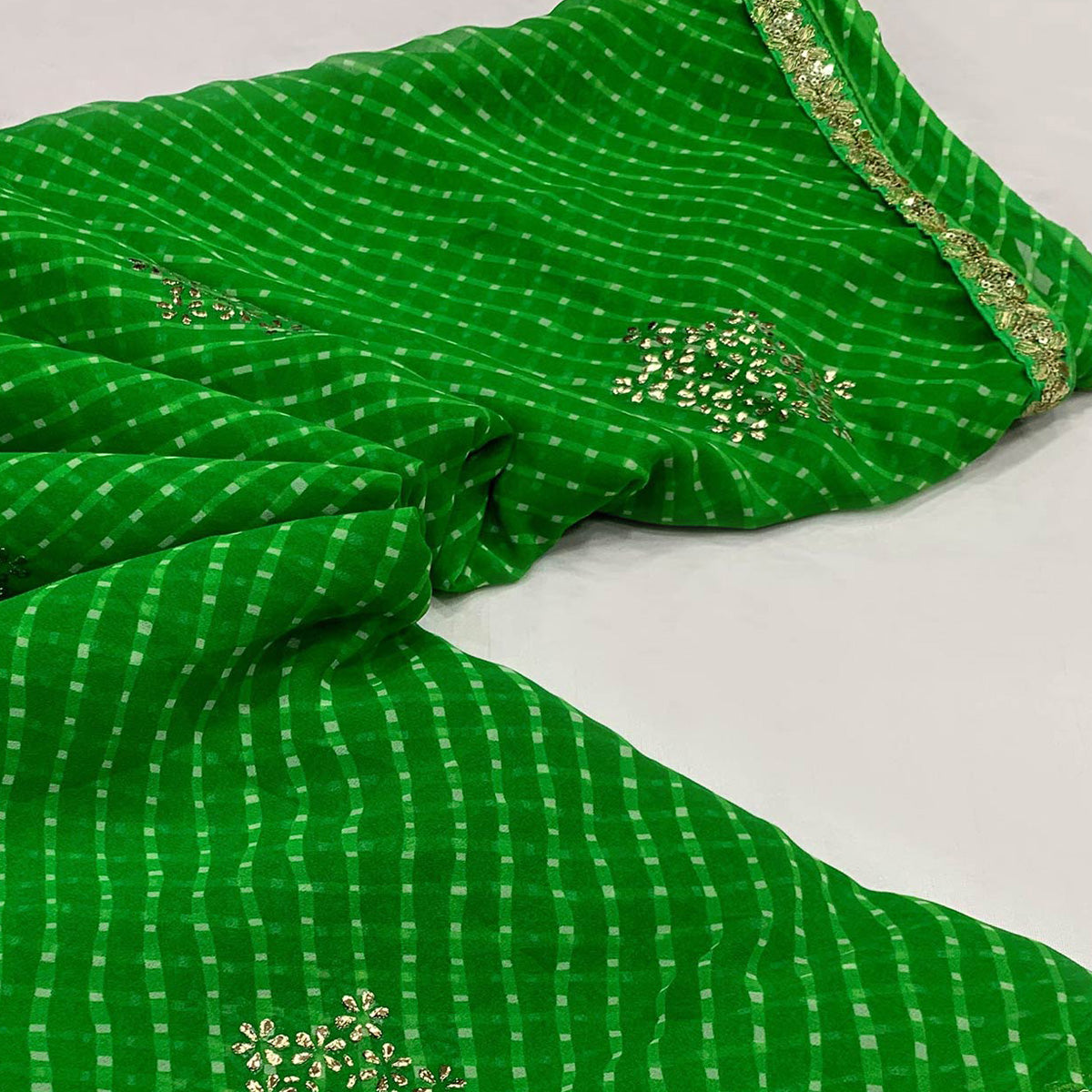 Green Printed Georgette Saree With lace Border