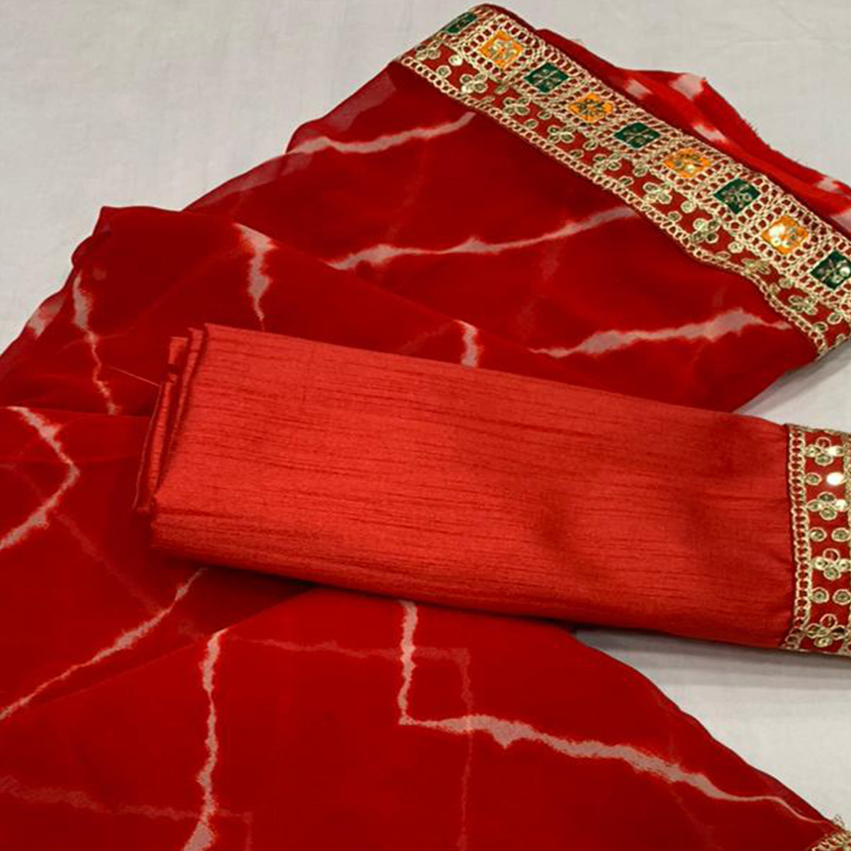 Red Leheriya Printed Georgette Saree With Sequins Border