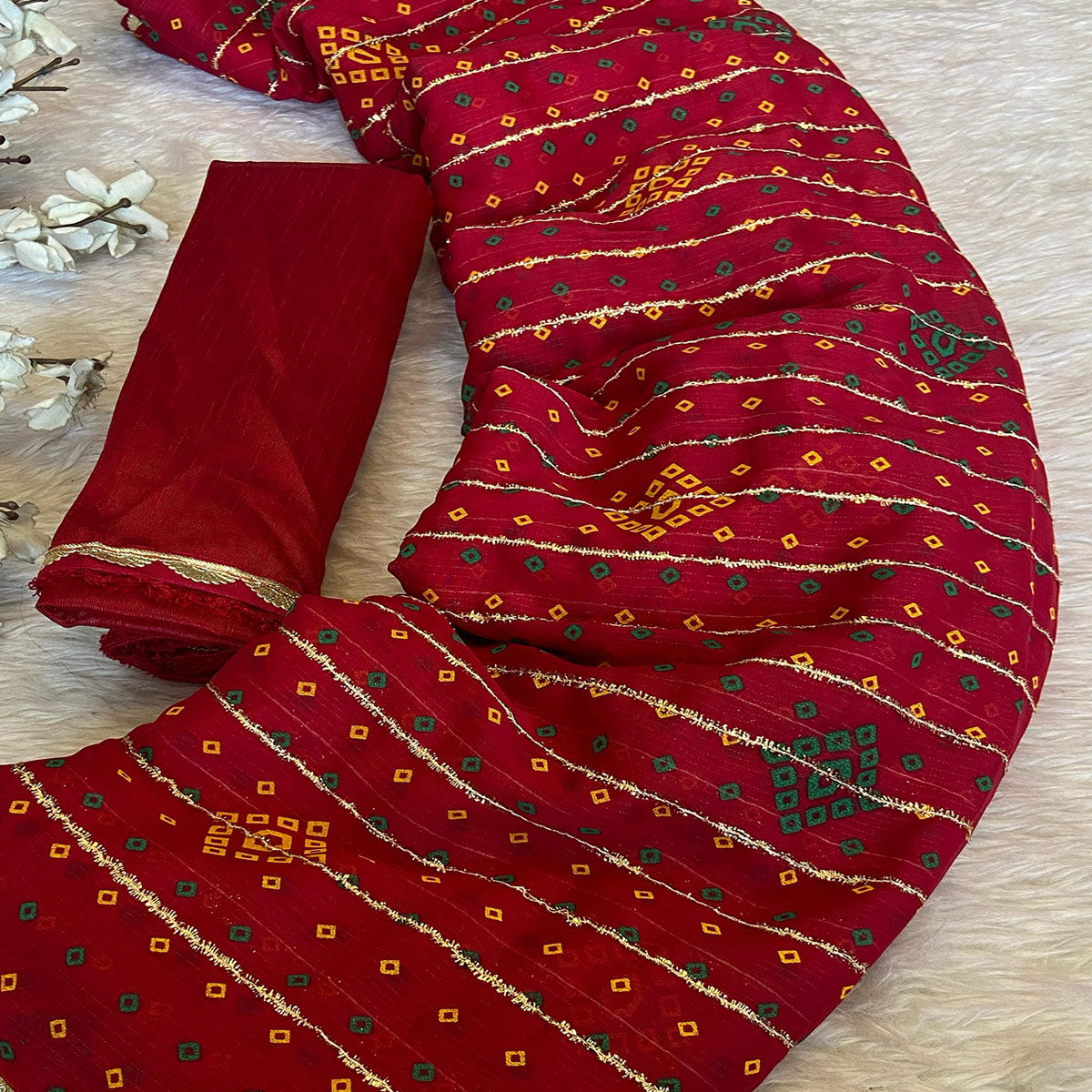 Pink Bandhani Printed Chiffon Saree with Graceful Touches of Zari Work