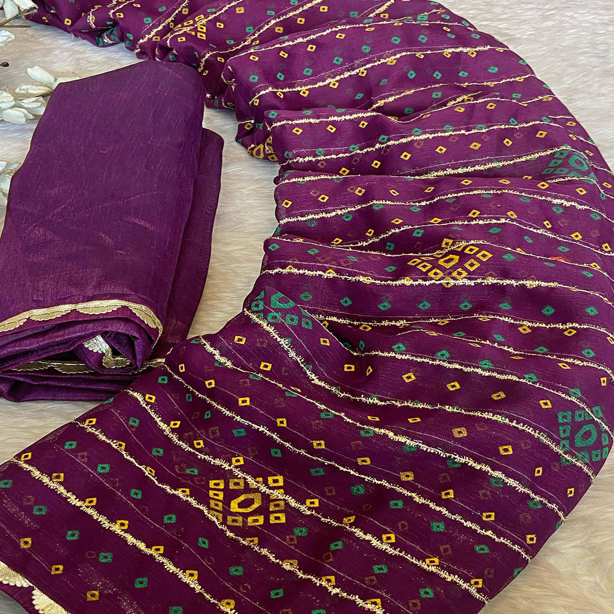 Purple Bandhani Printed Chiffon Saree with Graceful Touches of Zari Work