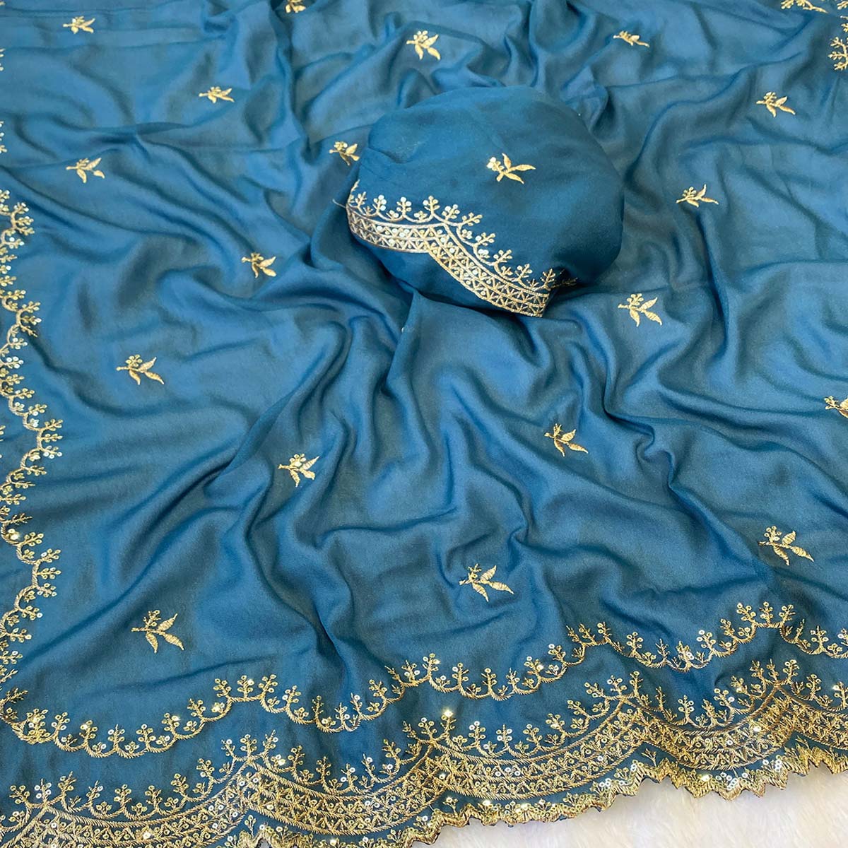 Teal Embroidered Star Georgette Saree Designed for Stylish Party Wear
