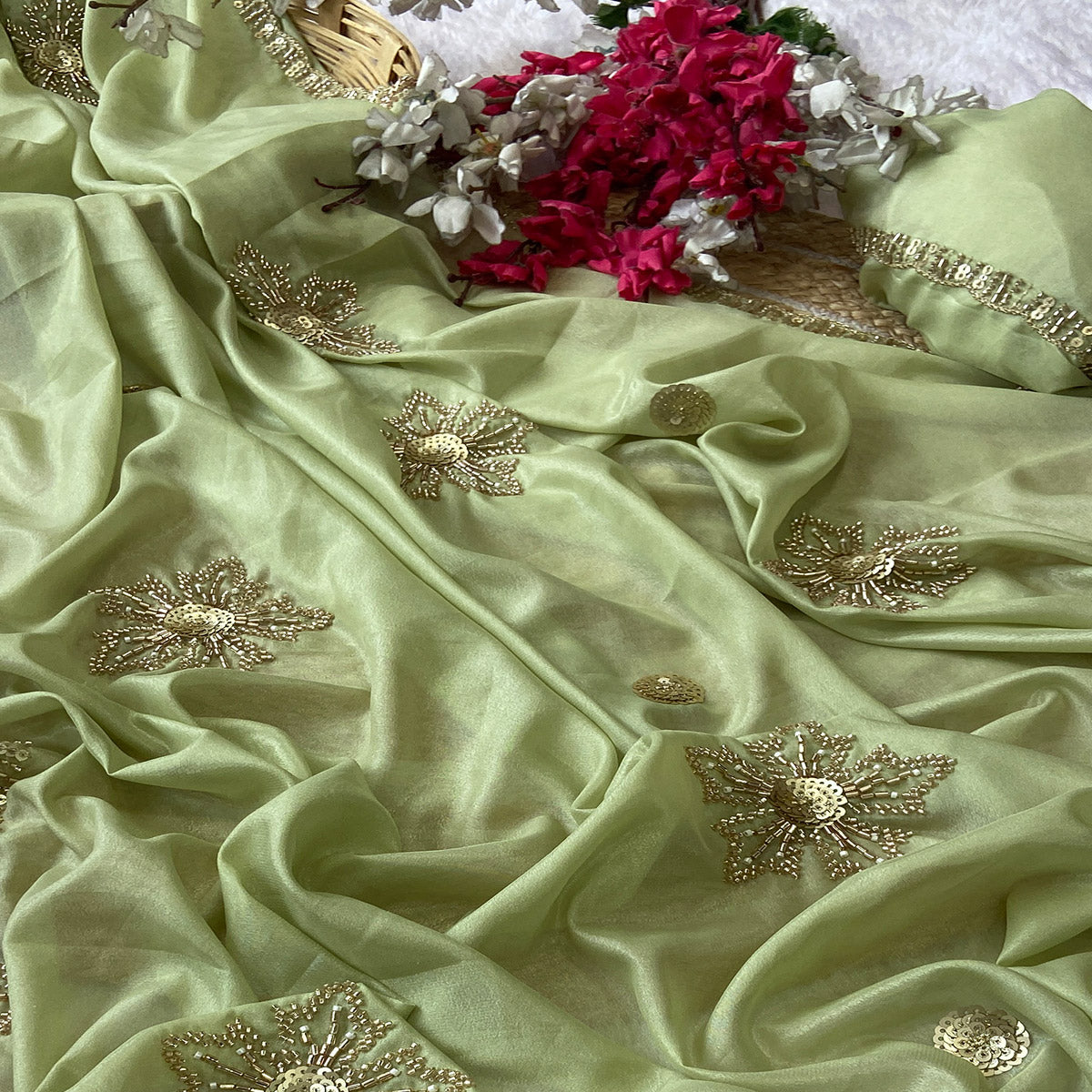 Green Partywear Saree in Crepe with Intricate Stone Work
