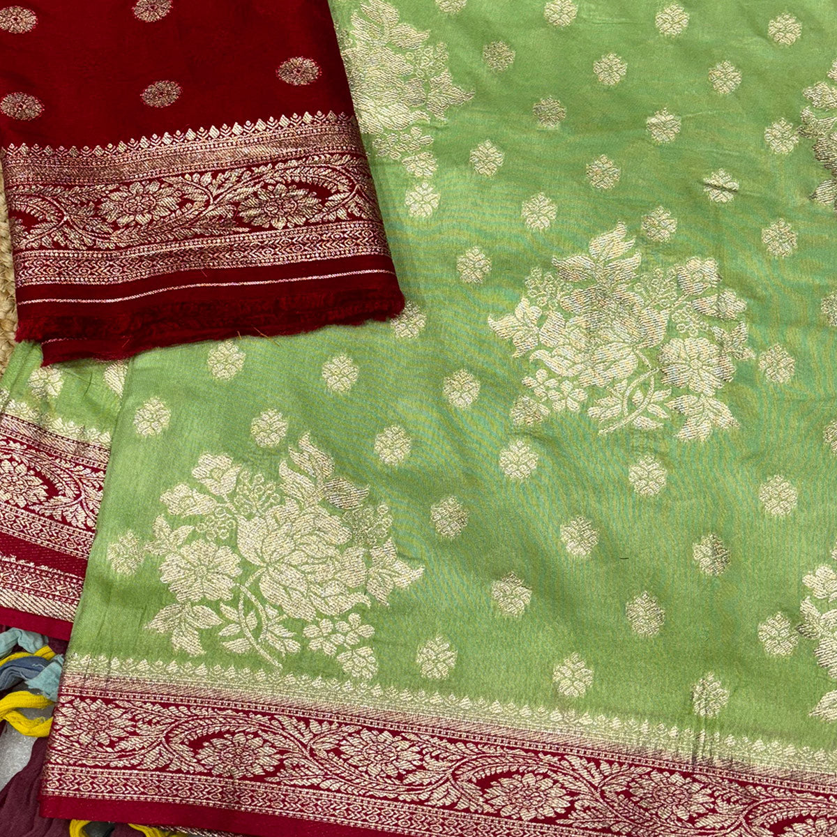 Green Dola Silk Woven Saree with Allover Zari Butti Design