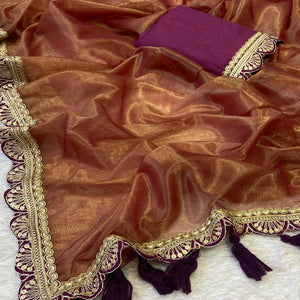 Orange Net Saree With Intricate Sequin Embroidery & Tassel Embellished Pallu